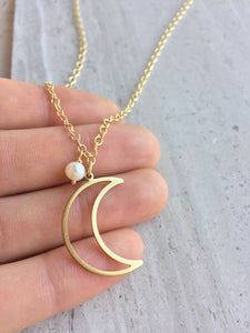 Brass Moon Necklace, in hand