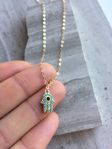 Turquoise CZ Hamsa Charm Necklace, in hand